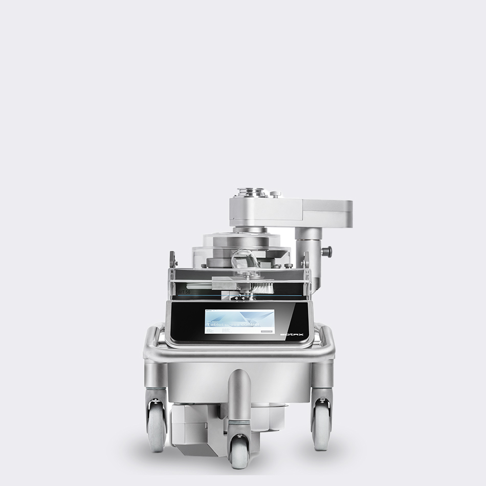 In order to avoid the linked tablet press's negative air pressure from influencing weight measurements, a sliding damper closes during testing.